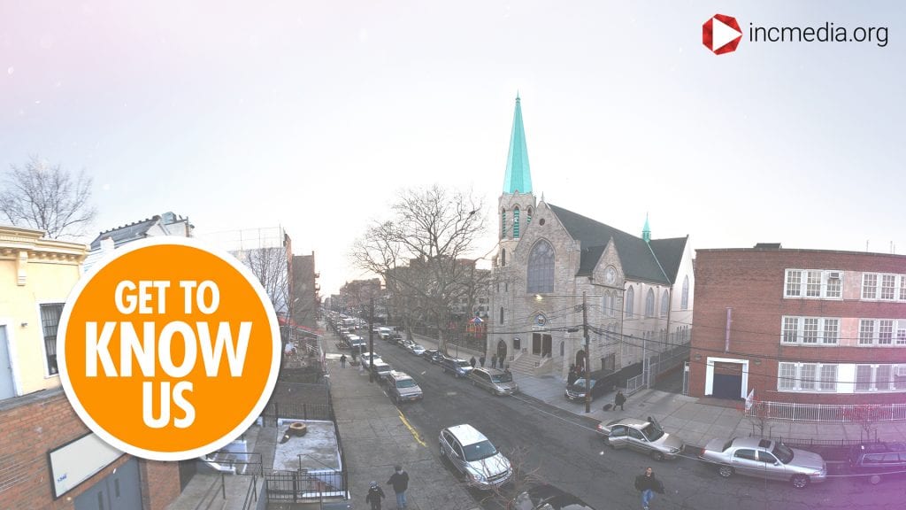 A neighborhood with rows of buildings and a chapel in between with text that reads Get To Know Us.