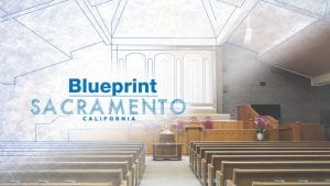 inside of worship building with blueprint logo overlay