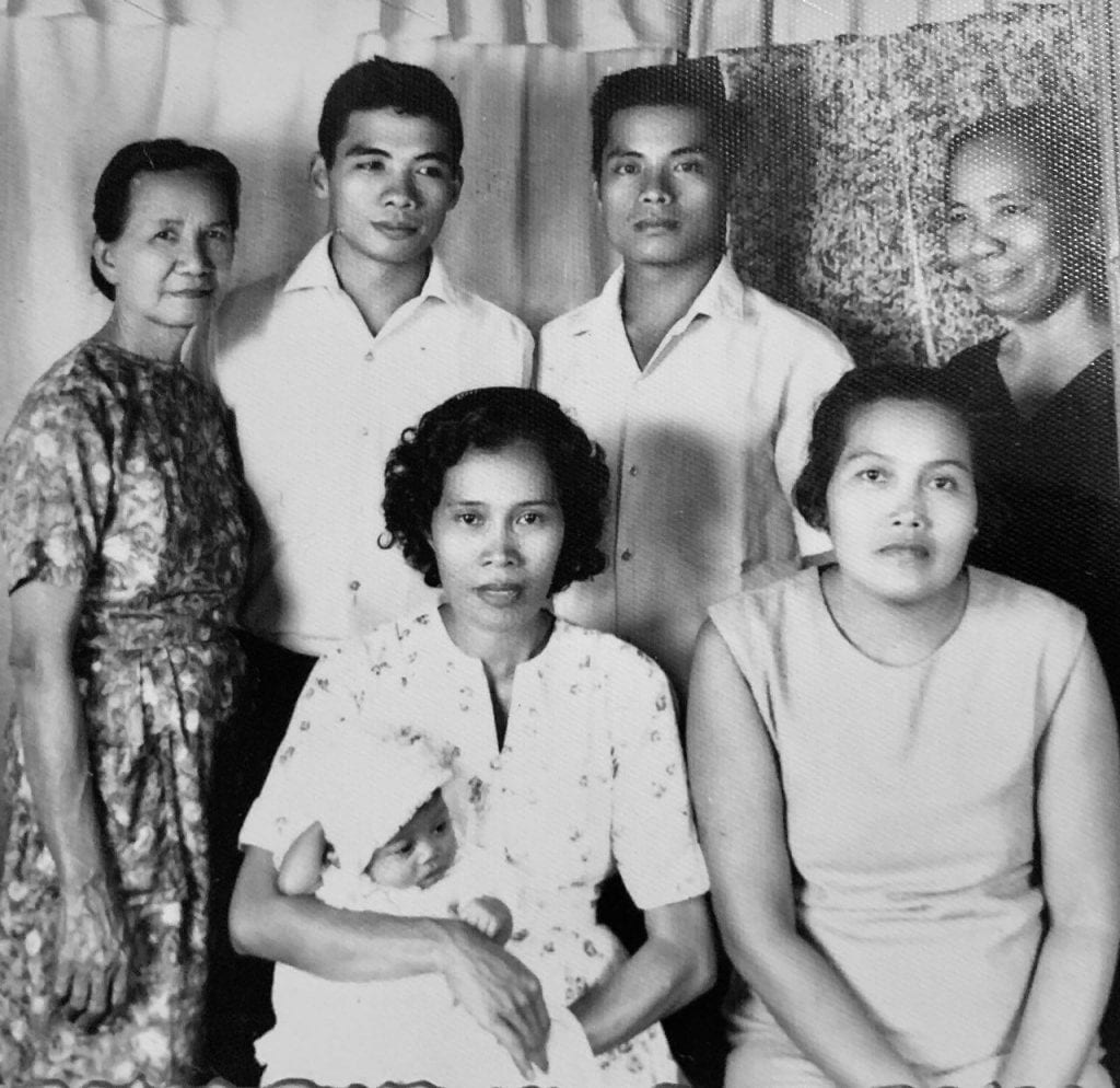 vintage black and white picture of six people smiling together